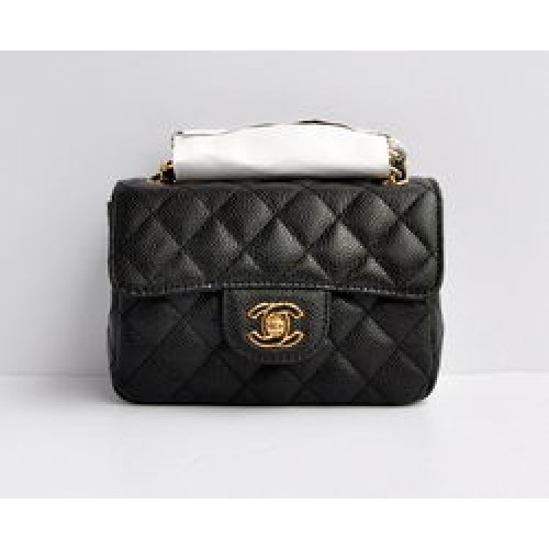 Bolso con solapa acolchado con cadena dorada de caviar negro clásico de Chanel