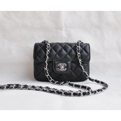 Bolso clásico con solapa acolchada con cadena plateada de piel de cordero negra de Chanel 1115