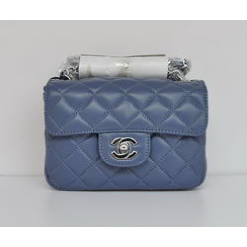 Bolso clásico con solapa acolchada con cadena plateada de piel de cordero azul de Chanel 1115