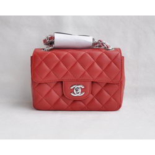 Bolso con solapa acolchada con cadena plateada de piel de cordero roja clásica de Chanel 1115