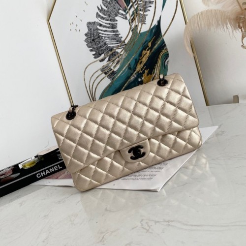Bolso de hombro con solapa de piel de cordero Chanel 1112 dorado