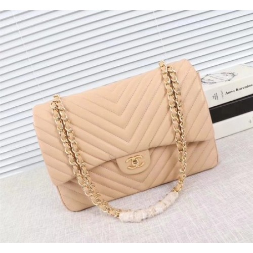 Chanel Maxi Classic Flap Bag Albaricoque Chevron Piel de oveja Cuero A58601 Oro