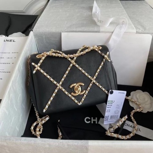 Bolso solapa Chanel AS2382 negro blanco
