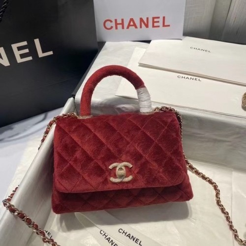 Bolso mini solapa con asa superior Chanel AS2215 Burdeos