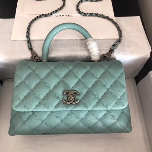 Bolso con solapa de cuero Caviar original de Chanel con asa superior A92290 verde y metal plateado