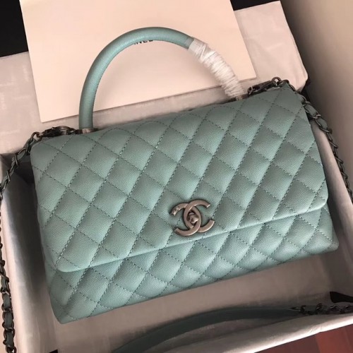 Bolso con solapa de cuero Caviar original de Chanel con asa superior A92292 verde y metal plateado