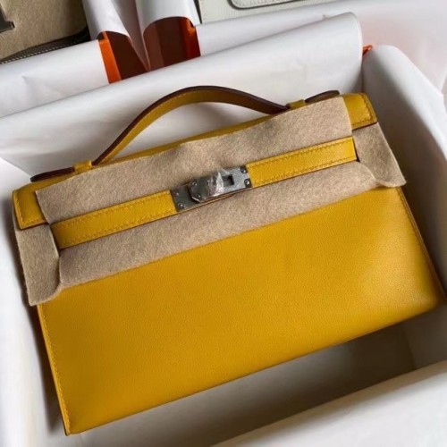 Hermes Original swift Leather KEL2278 amarillo y metal plateado