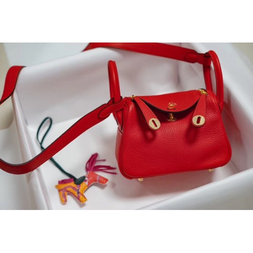 Bolso de cuero Hermes mini Lindy Togo LD19 metal en tono rojo y dorado