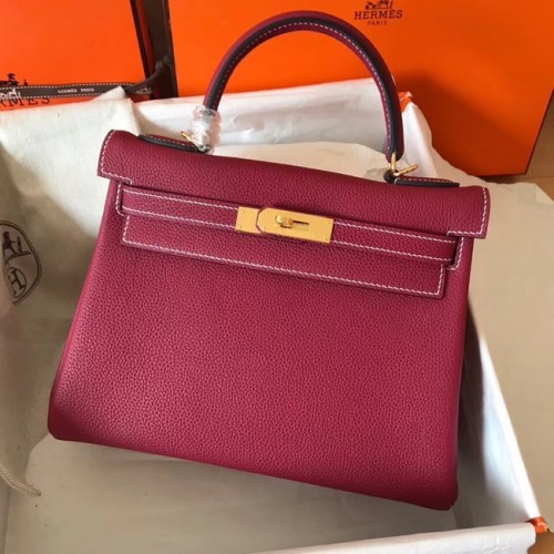 Bolso kelly de cuero Togo original Hermes KL320 fucsia