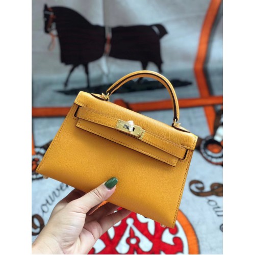 Hermes original mini Kelly chevre mysore K19CM Mango amarillo y metal dorado