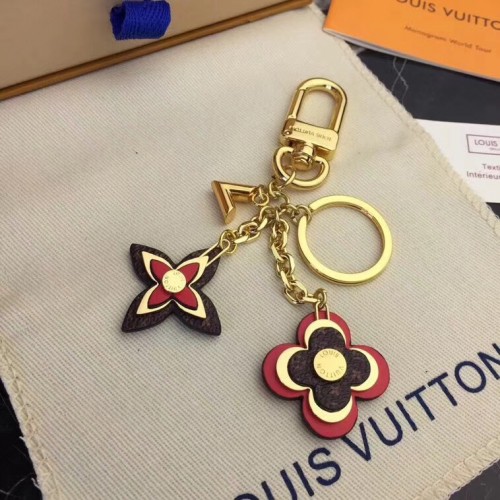 Louis vuitton BOLSO FLORES FLORECIENTES CHARM Y LLAVERO M63084