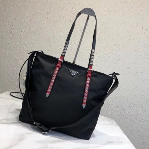 Bolso tote Prada de piel Saffiano y nailon 1BG212 negro y rojo