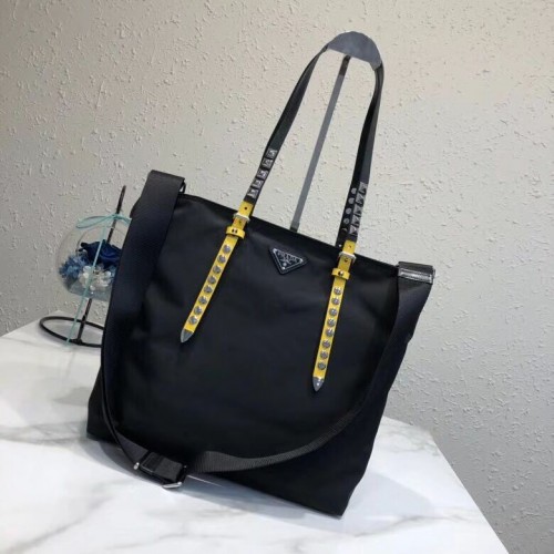 Bolso tote Prada de piel Saffiano y nailon 1BG212 negro y amarillo